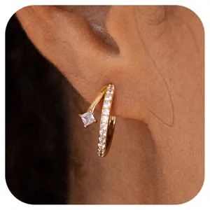 Gold-plated brass spiral ear cuff with square zircon stone and pave diamonds on ear