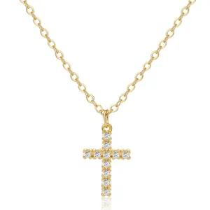 Gold plated brass necklace with a zircon-encrusted crown cross pendant on white background