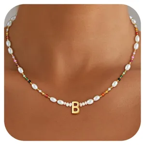 Bohemian style beaded necklace with colorful beads and a gold letter B pendant charm