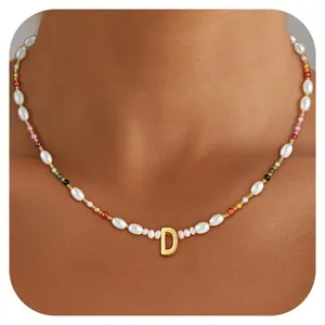 Bohemian beaded necklace with white pearls and gold plated initial letter D pendant