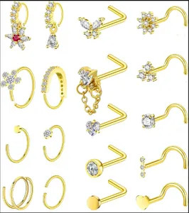 Detailed collection of 18 gold-plated nose studs and rings with sparkling zircon crystals