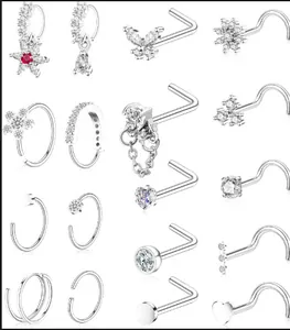 Detail of 18-piece nose stud set featuring cubic zirconia stars and butterfly shapes