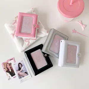 Detail of colorful star snap binders for K-pop photocards in pink, silver, and black