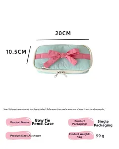 Detail view of bow pencil case with dimensions 20x10.5x4cm and lightweight design