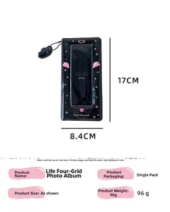 Detail view of black 4-cut photo album with pink angel wings and 40 card capacity
