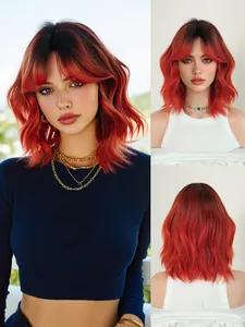 Detail view of 14-inch ombre red bob wig with bangs and loose wavy synthetic fibers