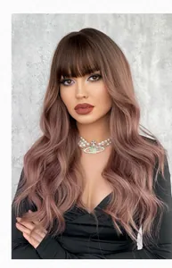Detail of long wavy synthetic wig with bangs in dusty pink brown hair color