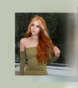 Detail of long wavy orange hair wig with blonde highlights on a fashion model