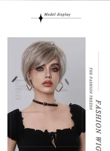 Detail view of champagne gold short bob wig with side bangs and smooth layered texture