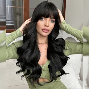 Natural black long wavy wig with bangs shown on a model in a cozy home setting