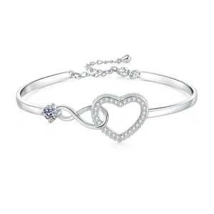 Infinity heart bracelet with pave cubic zirconia and adjustable silver chain