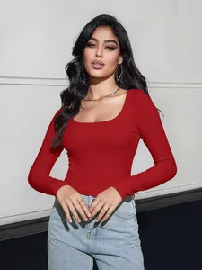 Close-up of ribbed knit texture on a red square neck slim-fit long sleeve top