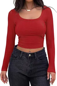 Macro detail of the ribbed knit fabric texture on a red long sleeve crop top