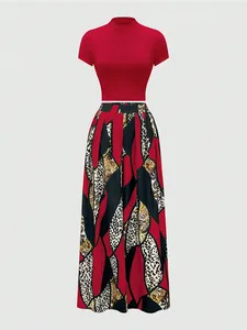 Detail of a two-piece set featuring a red crop top and leopard print wide-leg pants