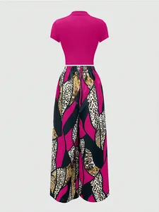 Rear view of two-piece set featuring a pink crop top and bold baroque print wide leg pants