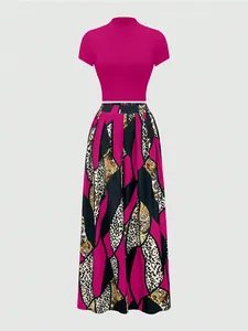 Detail of a two-piece set featuring magenta crop top and leopard print long skirt