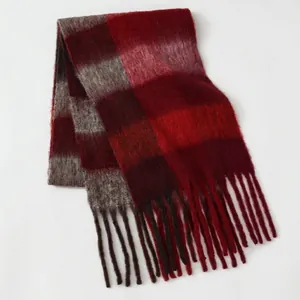 Thick plaid scarf in red and grey with long tassels for autumn and winter warmth