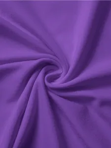 Detailed macro view of soft dark purple knit fabric showing high-quality texture