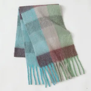 Thick checkered mohair scarf with tassels in light blue, green, and burgundy tones