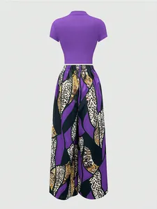 Detail of high-waist wide-leg pants with purple leopard and baroque print patterns