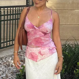 Pink floral print camisole with adjustable straps and ruffled irregular hem for summer