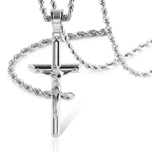Detailed close-up of silver crucifix cross pendant with Jesus figure and rope chain necklace