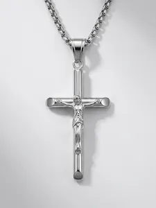 Detailed view of silver cross pendant with Jesus relief and dimension annotations