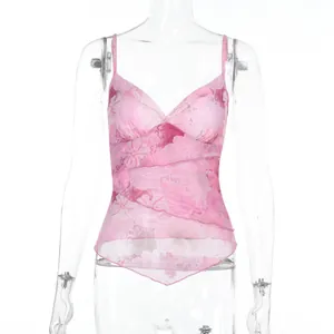 Detail of pink floral mesh top featuring ruffled layers and adjustable straps style