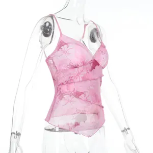 Detail of pink floral mesh top featuring multi-layered ruffles and adjustable straps