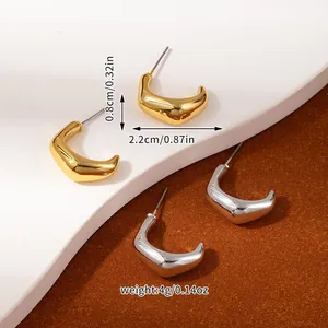 Detailed view of gold and silver curved petal earrings with dimensions and weight specs