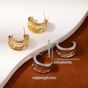 Detailed view of textured C-shape earrings in gold and silver with size measurements