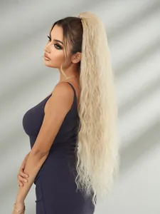 Detail view of 36 inch light blonde water wave ponytail extension with natural texture