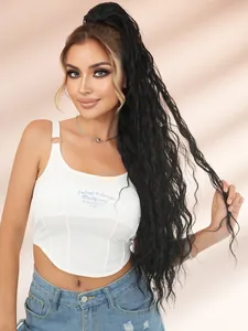 Close-up of white corset-style camisole with blue lettering and curved hem detail
