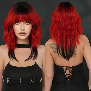 Detail view of high quality red and black gradient wolf cut wig with bangs and wavy texture