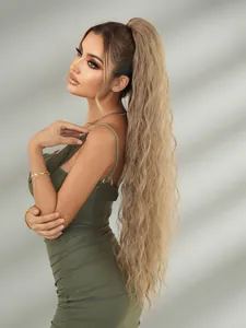 Detail of 36-inch water wave ponytail extension in honey brown showing volume and curls