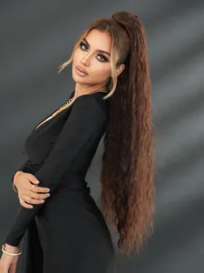 Detail of 36 inch water wave drawstring ponytail extension in dark brown synthetic hair