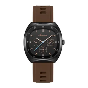 Macro detail of square black quartz watch with brown strap and rose gold markers