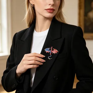 Elegant vintage dragon brooch with American flag pattern pinned on black blazer lapel