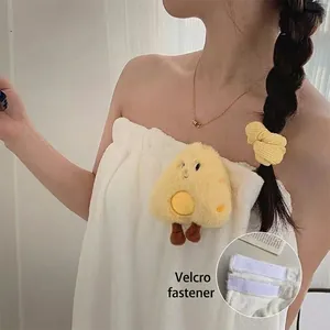 Wearable white coral fleece bath towel dress with cartoon decor and magic tape closure