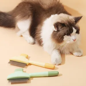 Macro shot of self-cleaning pet grooming brushes in yellow and green for long-haired cats