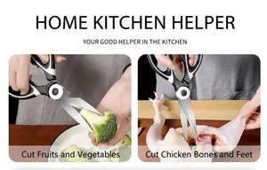 Kitchen shears cutting fresh broccoli and raw chicken bone on a wooden board