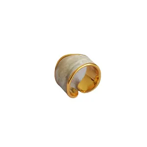 Minimalist wide gold-plated open ring with creamy enamel marble texture in bread shape