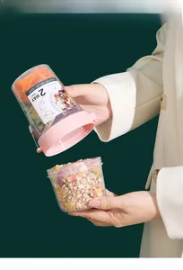 Detailed view of pink 2-layer salad cup with 500ml and 300ml separate compartments