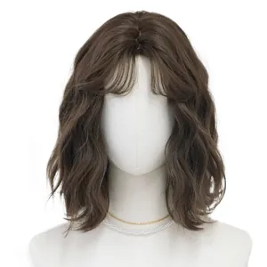 Short wavy dark brown wig with bangs shown on a mannequin with a pearl necklace