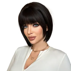 Short black bob wig with neat bangs and smooth finish shown on a professional model