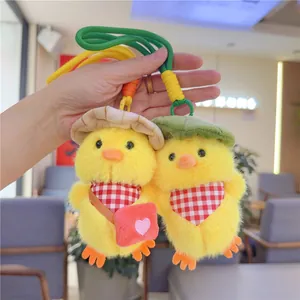 Cute yellow duck plush keychain set with hat and crossbody bag accessories