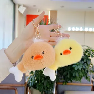 Portachiavi in peluche a forma di coscia di pollo gialla e arancione con anello dorato