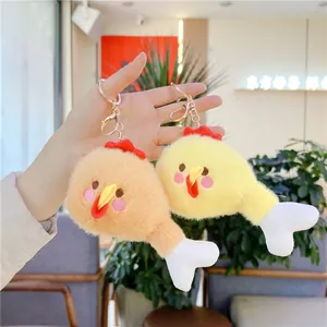 Simpatico portachiavi in peluche a forma di coscia di pollo con facce buffe