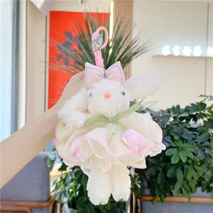 Lapin en peluche Lolita avec robe en dentelle blanche et détail de ruban rose