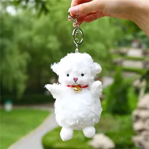 Cute white plush sheep keychain with a red collar and golden bell for bag decoration